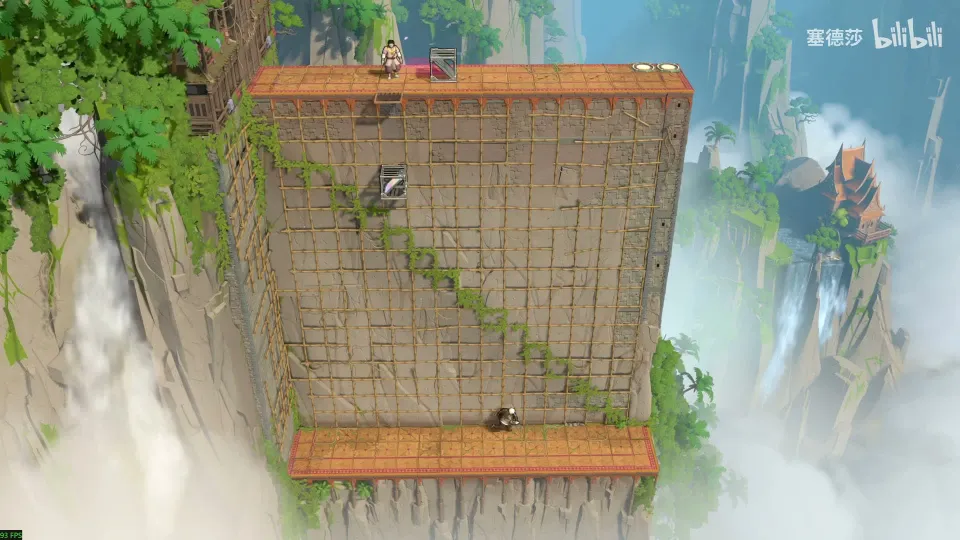 High Mirrors puzzle 43: a huge cliff wall with a diagonal vine and a grid of wooden frames, a mirror near the top and a ledge at the bottom